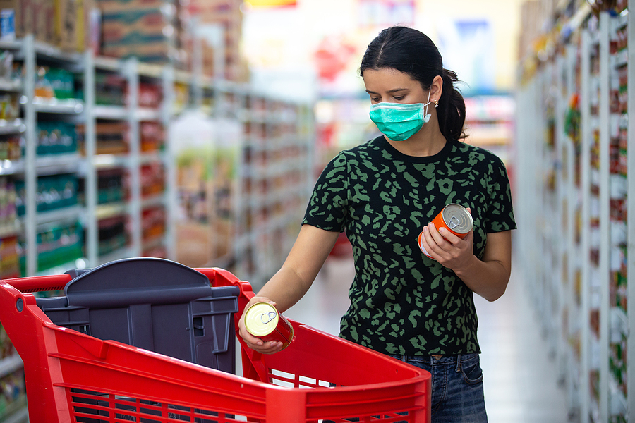 Grocery shopper with mask