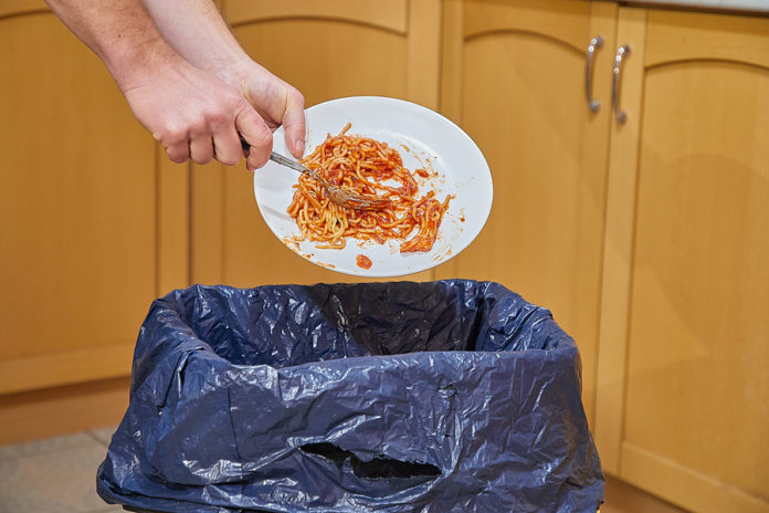 Food leftower thrown in the kitchen garbage bin, food waste prob