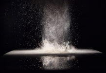 Clean as Competitive Advantage: Q&A With Nilfisk on How Hygiene Innovation Is Driving Efficiency, Safety, and Sustainability The Loose Flour Lies On The Black Background