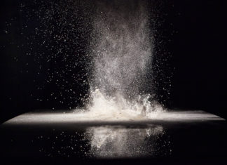 Clean as Competitive Advantage: Q&A With Nilfisk on How Hygiene Innovation Is Driving Efficiency, Safety, and Sustainability The Loose Flour Lies On The Black Background