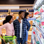 Food Prices Rise 1.1% in July: CPI Report Portrait Of Happy Black Family With Trolley Shopping Together At