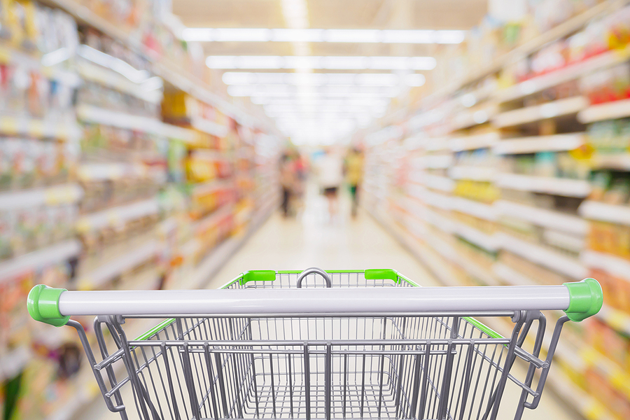 Supermarket Aisle With Empty Shopping Cart At Grocery Store Reta