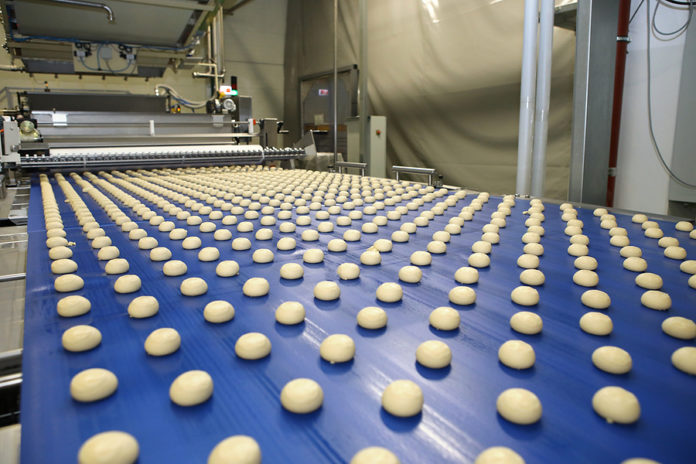 Close Up Of Automated Biscuit Cookies Shape Forming Machine. Sel