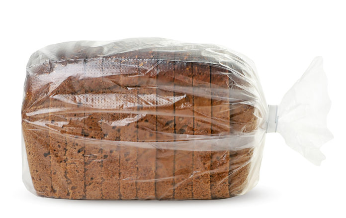 Rye Bread In A Plastic Bag, Bread In A Package On A White Backgr