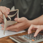 Consumers Will Cut Back on Food Spending This Holiday Season: Vericast Stressed, Problem Asian Young Couple Love Calculate Loan, Holdin