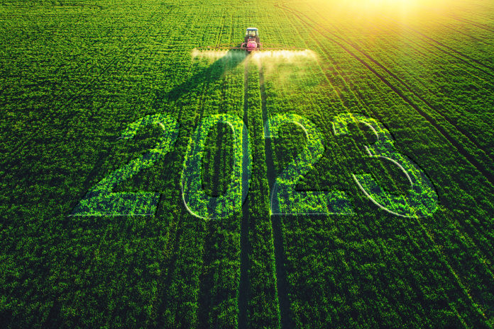 2023 Happy New Year Agricultural Business Concept. Aerial View O