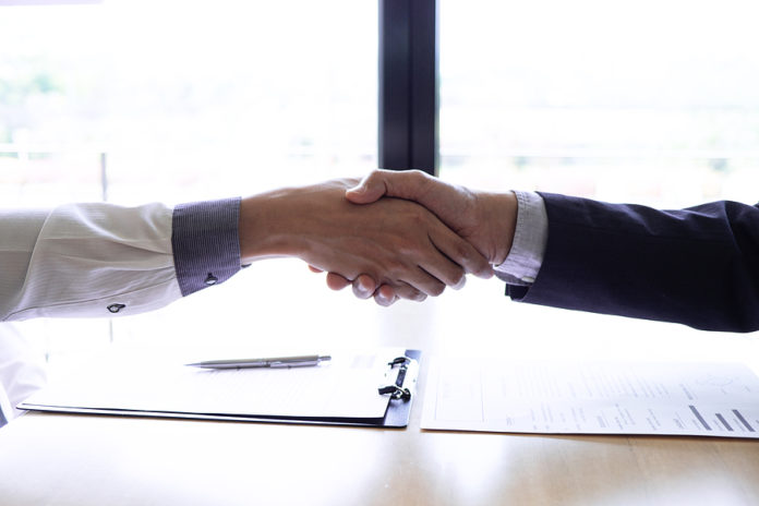 Job Seeker And The Company Owner Making Handshake In The Office