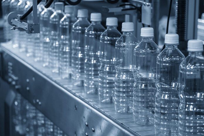 Close Up Scene Of The Empty Drinking Water Bottles On The Conve