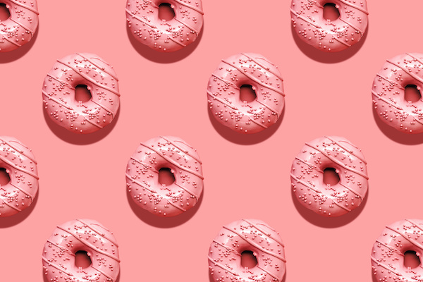 Creative food diet concept photo of donuts background.
