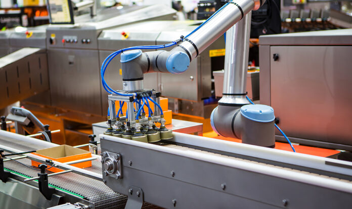 Automated Robot Arm Lifting Food Can To Conveyor Belt In Food In