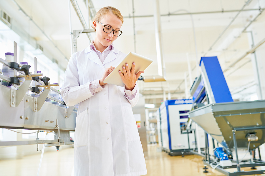 Portrait Shot Of Pretty Blonde Technologist Wearing White Coat T