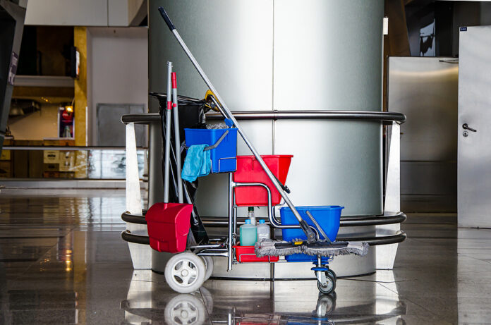 Cleaner Cart In A Public Place. Mobile Cart With Cleaning Produc